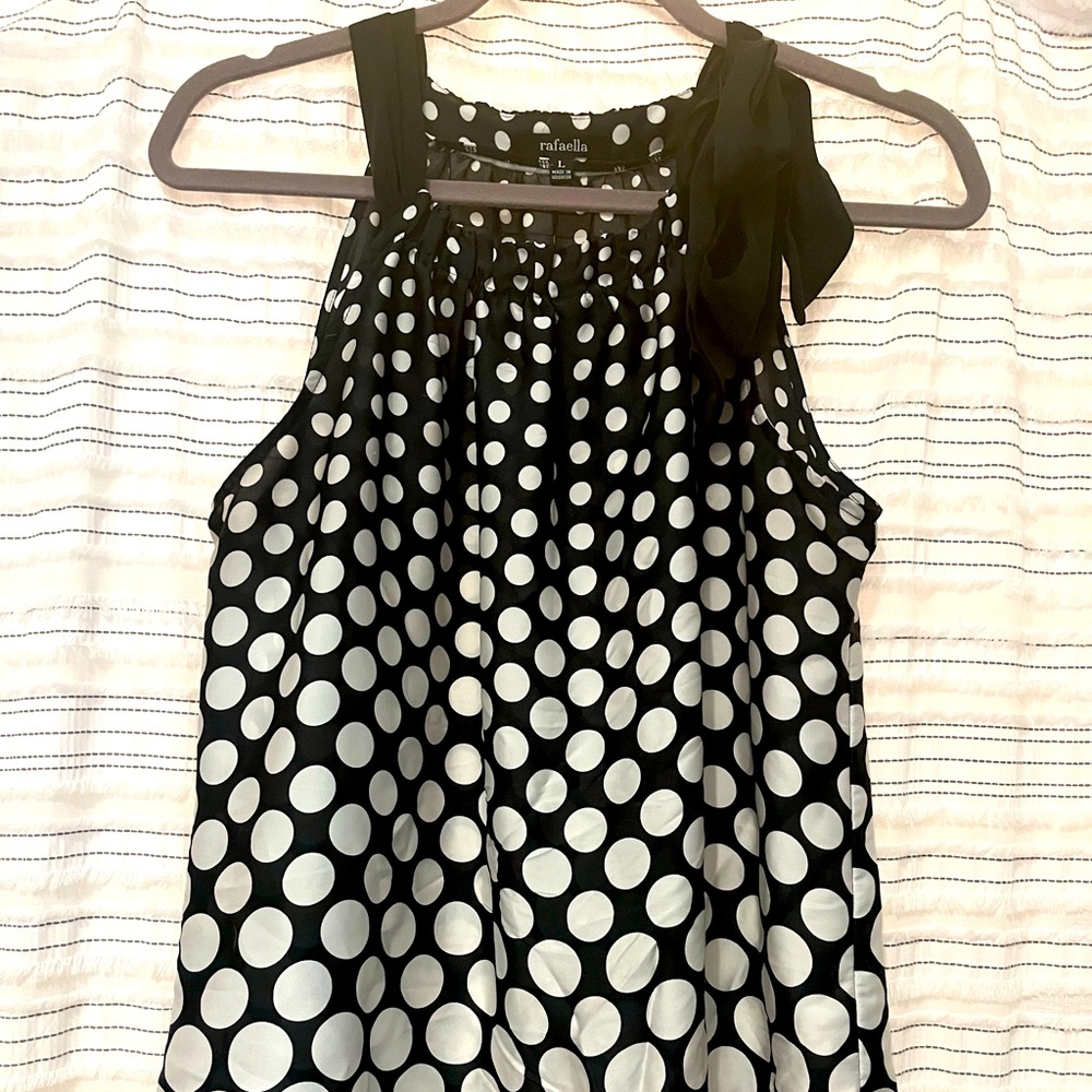 Sleeveless polka dot blouse